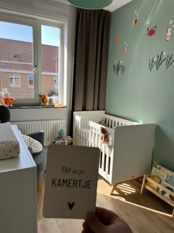 Groene babykamer met oceaan thema